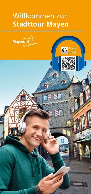 Plakat mit einem Jungen und Kopfhörern und Handy in der Mayener Brückenstraße 