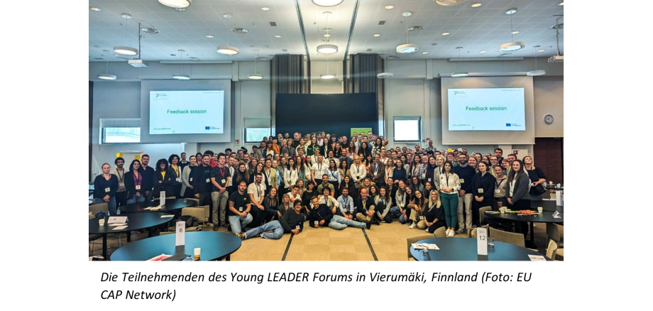 Gruppenfoto in einem Tagungsraum