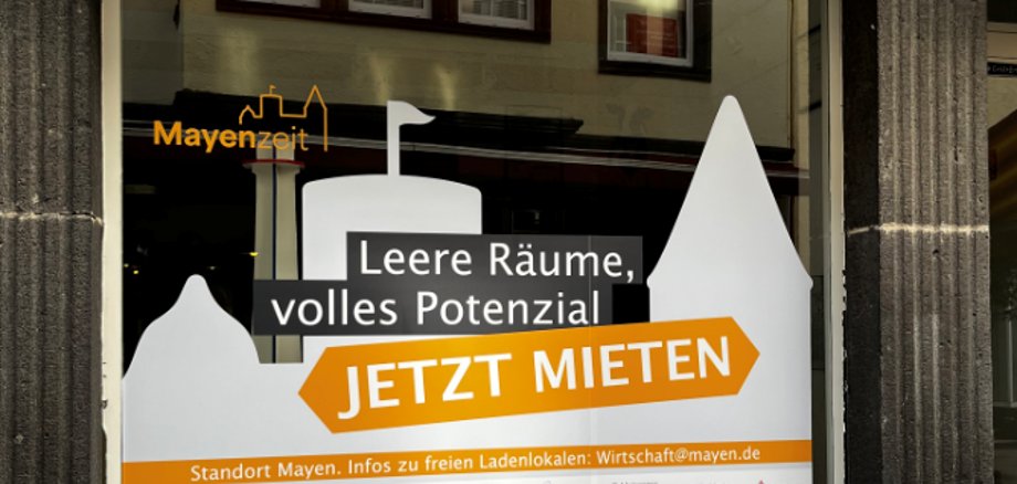 Schaufenster eines Leestands mit Beklebung